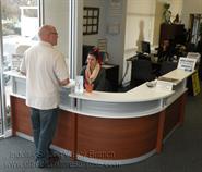 Reception Desk with multi-height transaction counters